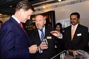 Nick Clegg MP, UK Deputy Prime Minister, left, with Renishaw's Rhydian Pountney and Sanjay Sangam